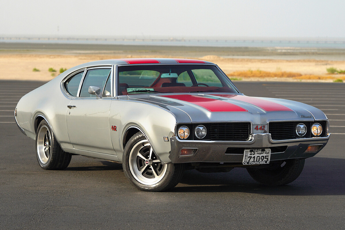 1969 Oldsmobile 442 Coupe Silver w-red